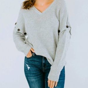 Brand new with tags boutique sweater. Size small.